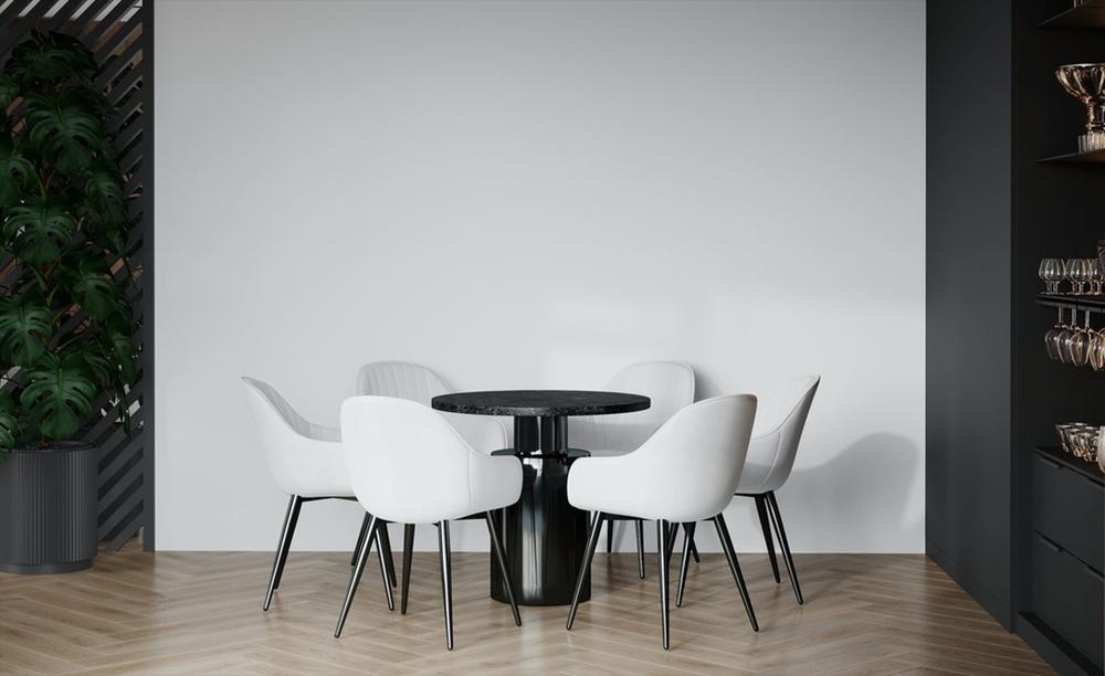 black round table with white chairs at the dining area