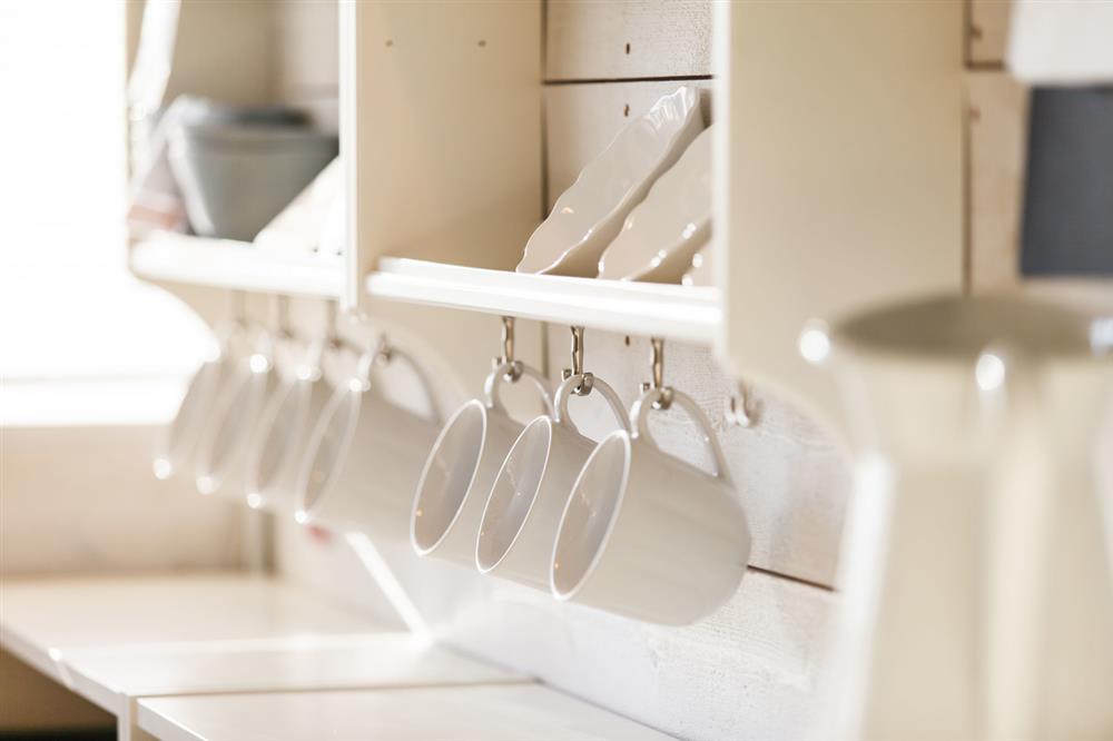 Hangers on the kitchen wall