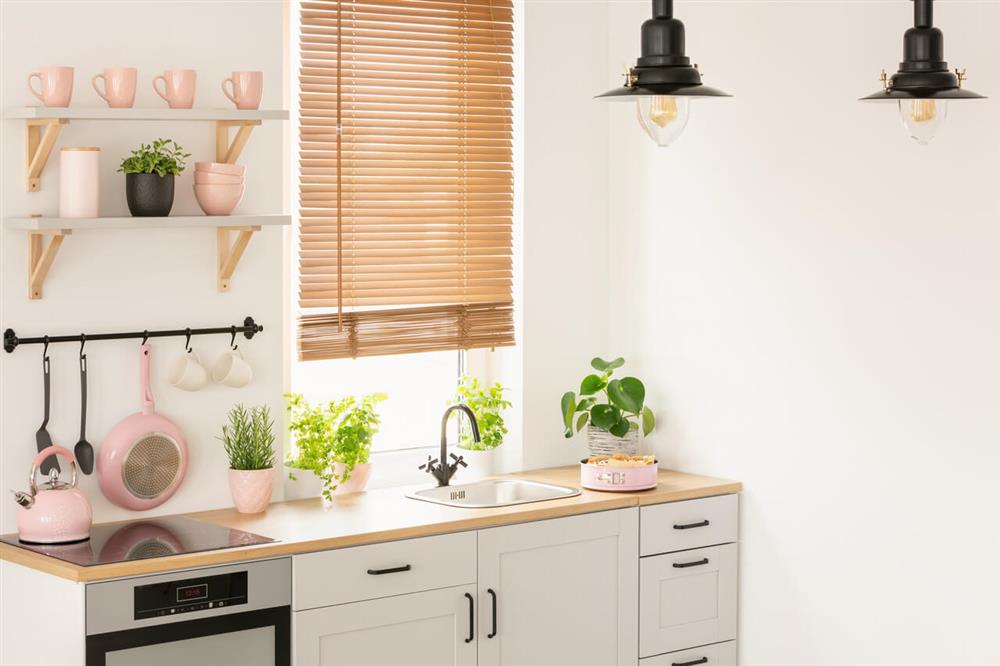 kitchen with pink and white theme
