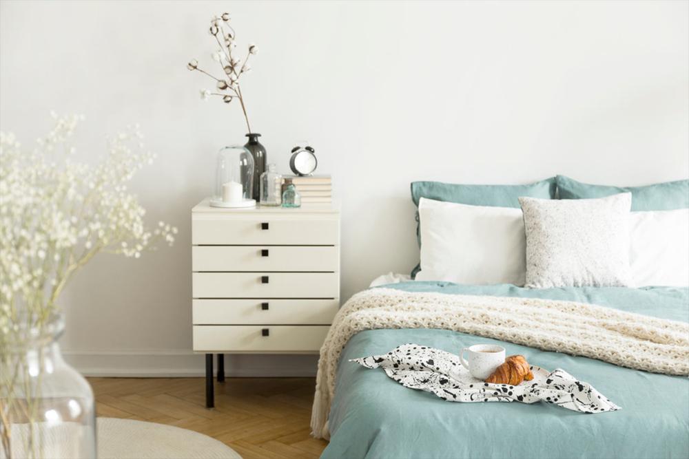 white nightstand decoration in bedroom