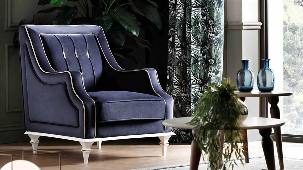 The dark blue colored armchair
