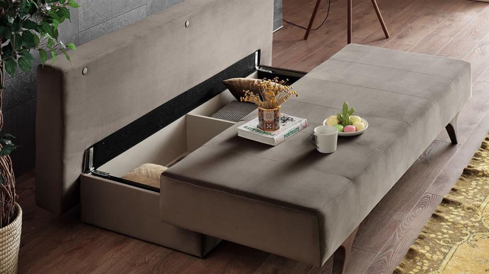 A sofa bed which has storage under it